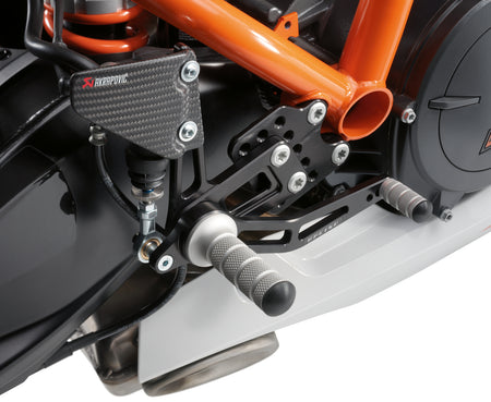 KTM Justerbara fotpinnefästen V+H, komplett